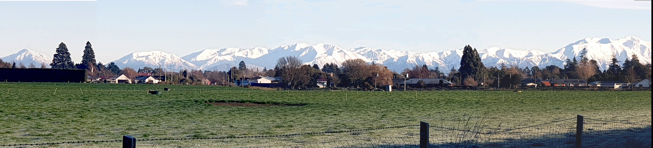 Rakaia township looking west towards the snow-covered Southern Alps